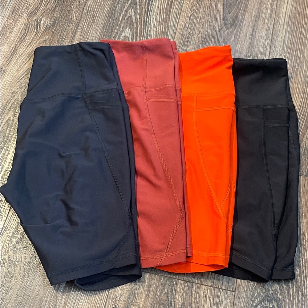 Old Navy Active Shorts in Black, mauve, and Orange (sold as a lot of 4 pairs)